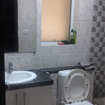Bathroom in 2.5 BHK Apartment at Mahagun Mirabella, Sector 79 – for Rent