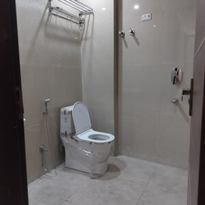Bathroom in 2 BHK Builder Floor at Chattarpur – for Rent