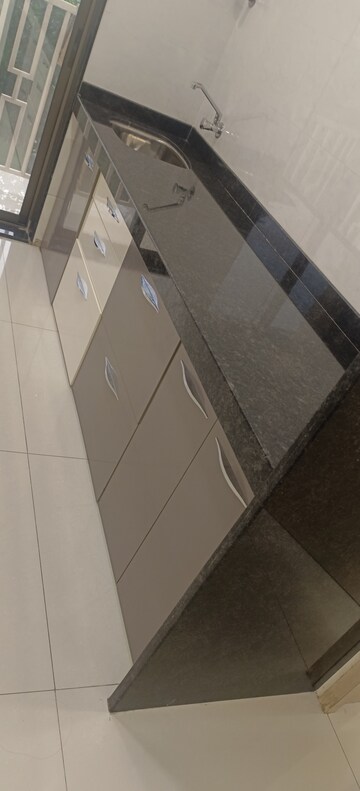 Kitchen in 1 BHK Apartment at Radheya Sai Enclave, Naigaon East – for Sale