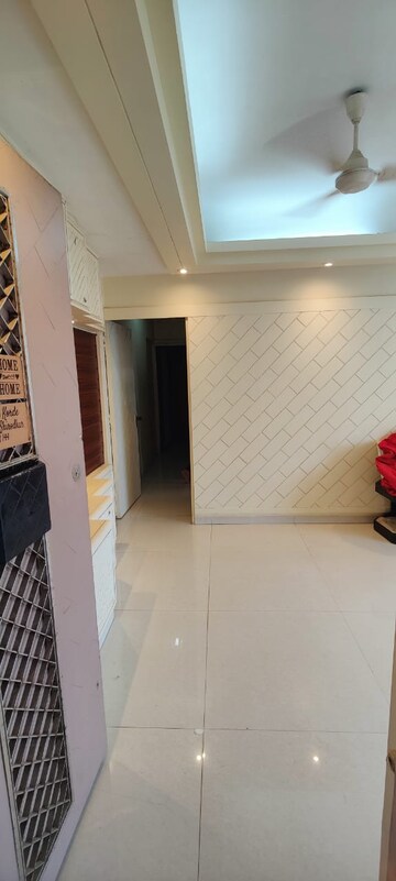 Living Room in 2 BHK Apartment at Utpal Park Apartment, Mahim – for Rent