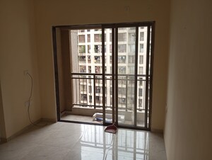 Room in 1 BHK Apartment at Sunteck West World, Tivri – for Sale