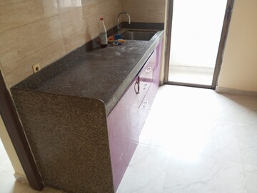 Kitchen in 1 BHK Apartment at Sunteck West World Phase 2 Tivri, Naigaon East – for Rent