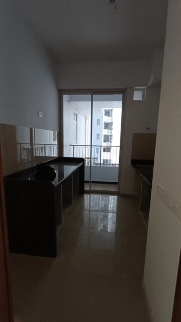 Kitchen in 2 BHK Apartment at Courtyard by Narang Realty and The Wadhwa Group, Pokhran Road No Two – for Rent