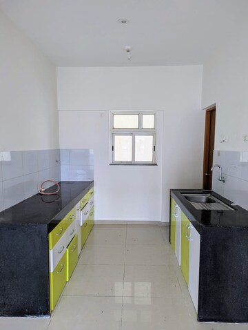 Kitchen in 2 BHK Apartment at The Chatterjee The Crown Greens, Hinjewadi – for Rent