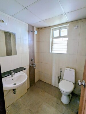 Bathroom in 2 BHK Apartment at The Chatterjee The Crown Greens, Hinjewadi – for Rent