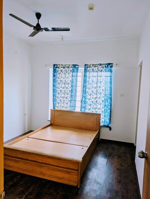 Living Room in 2 BHK Apartment at The Chatterjee The Crown Greens, Hinjewadi – for Rent