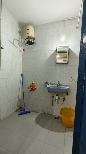 Bathroom in 2 BHK Apartment at Naiknavare Gardenia Society Phase 1, Wadgaon Sheri – for Rent