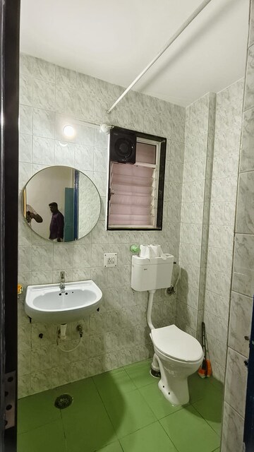 Bathroom in 2 BHK Apartment at Naiknavare Gardenia Society Phase 1, Wadgaon Sheri – for Rent