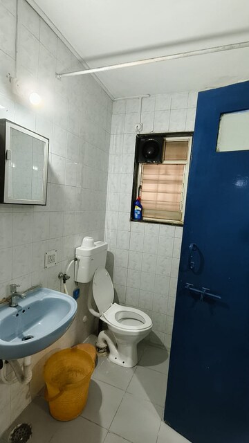 Bathroom in 2 BHK Apartment at Naiknavare Gardenia Society Phase 1, Wadgaon Sheri – for Rent