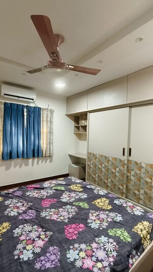 Bedroom in 2 BHK Apartment at Naiknavare Gardenia Society Phase 1, Wadgaon Sheri – for Rent