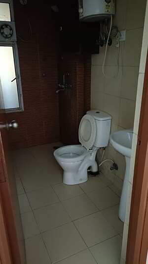 Bathroom in 3 BHK Apartment at Mahagun Mywoods, Sector 16c Greater Noida – for Rent