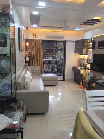 Living Room in 1 BHK Apartment at Guru Krupa CHS Mulund West, Mulund West – for Sale