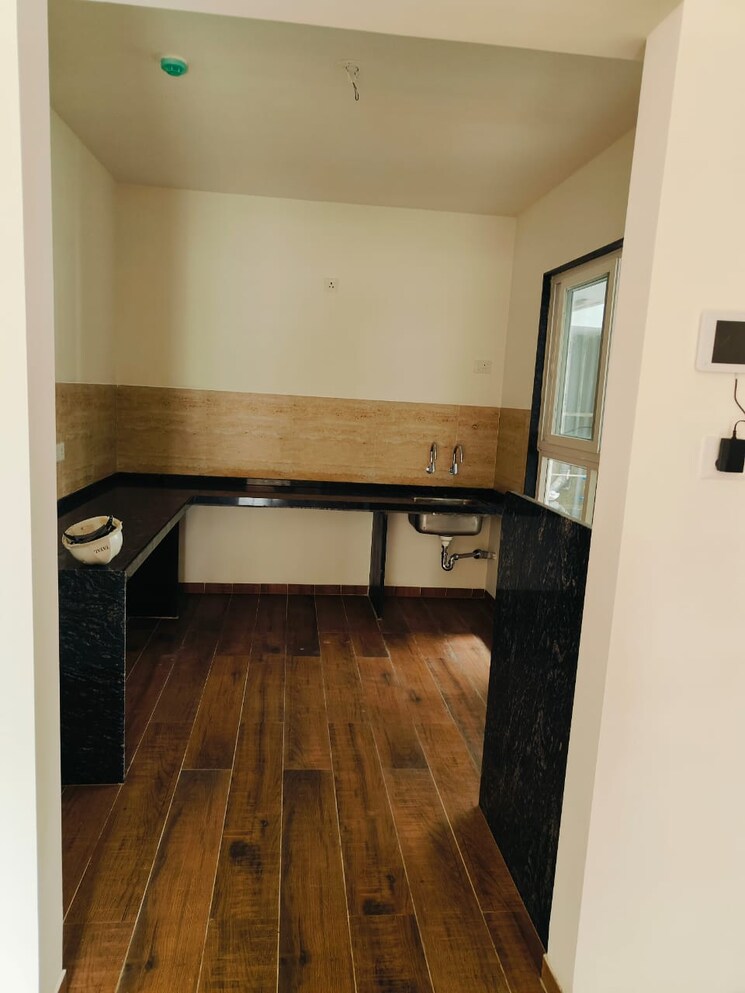 Kitchen, unique-k-town 3 Bedroom 948 Sq.Ft. Apartment In Kiwale Pune 9275403