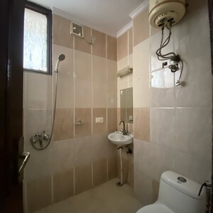 Bathroom in 3 BHK Builder Floor at Chattarpur – for Rent