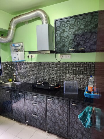 Kitchen in 2 BHK Apartment at Shrachi Greenwood Sonata, Rajarhat New Town – for Rent