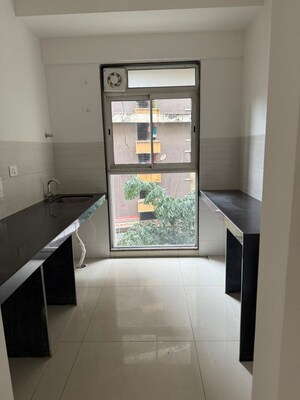 Kitchen in 2 BHK Apartment at Godrej Tranquil, Kandivali East – for Rent