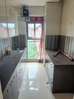 Kitchen in 2 BHK Apartment at Kalpataru The Sunrise, Kolshet Road – for Rent