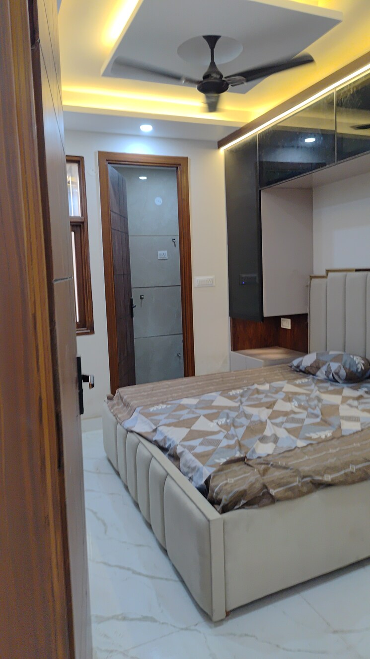 Bedroom, mohan garden 3 Bedroom 90 Sq.Yd. Builder Floor In Mohan Garden Delhi 9275743