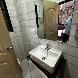 Bathroom in 3 BHK Apartment at Evershine Greens, Anand Nagar – for Sale