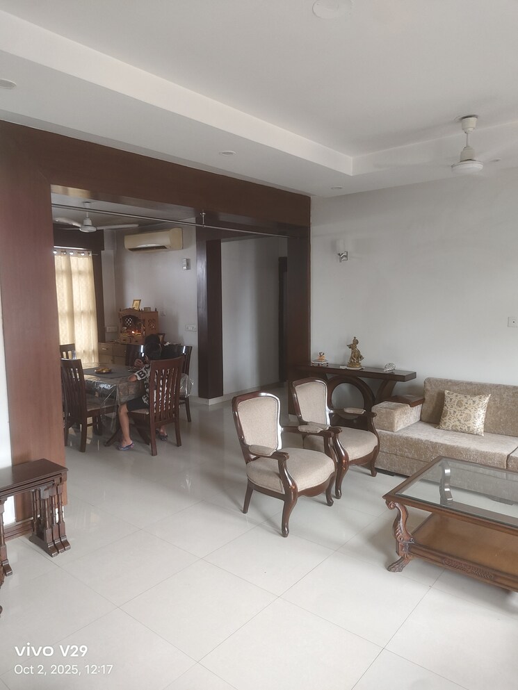 Living Room, tata-raheja-raisina-residency 5 Bedroom 5953 Sq.Ft. Apartment In Sector 59 Gurgaon 9275746