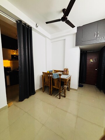 Living Room in 2 BHK Apartment at Sikka Karnam Greens, Sector 143b – for Rent