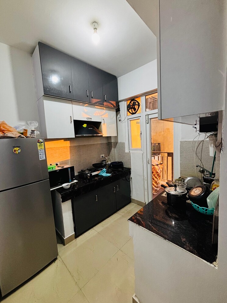 Kitchen, sikka-karnam-greens 2 Bedroom 940 Sq.Ft. Apartment In Sector 143b Noida 9275795
