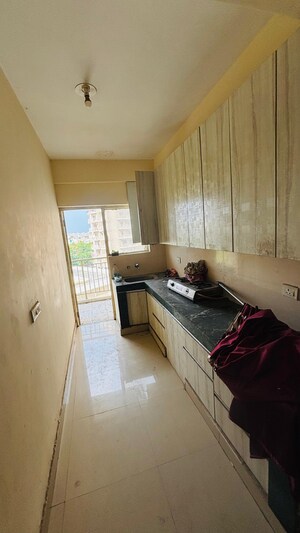 Kitchen in 2 BHK Apartment at Adore Happy Homes Grand, Sector 85 – for Rent