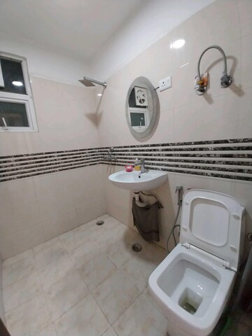 Bathroom in 1 BHK Apartment at Shree Vardhman Green Court, Sector 90 – for Rent