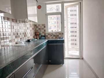 Kitchen in 1 BHK Apartment at Shree Vardhman Green Court, Sector 90 – for Rent