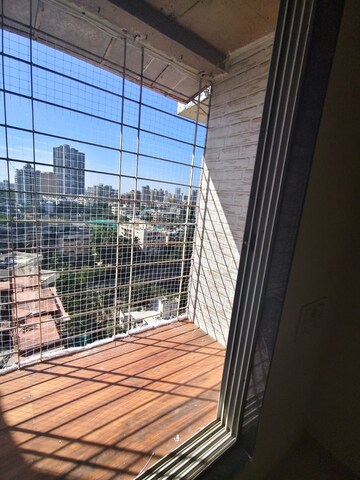 Balcony in 3 BHK Apartment at New Amrut Apartment, Malad West – for Rent