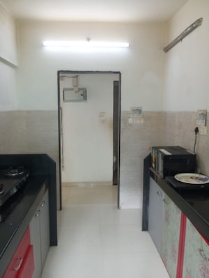 Kitchen in 1 BHK Apartment at DB Orchid Ozone, Dahisar East – for Sale
