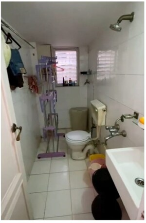 Bathroom in 3 BHK Apartment at Dakshina Park, Vile Parle West – for Sale