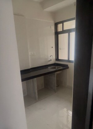 Kitchen in 2 BHK Apartment at Siddharth Riverwood Park, Sagarli Gaon – for Rent
