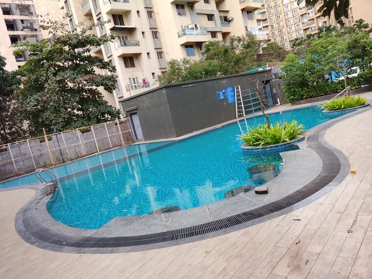 Swimming Pool, pyramid-atlante 2 Bedroom 587 Sq.Ft. Apartment In Tathawade Pune 9276200