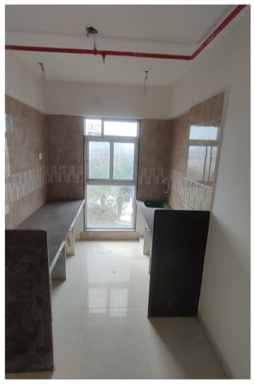 Kitchen in 2 BHK Apartment at Millionaire Heritage, Andheri West – for Sale