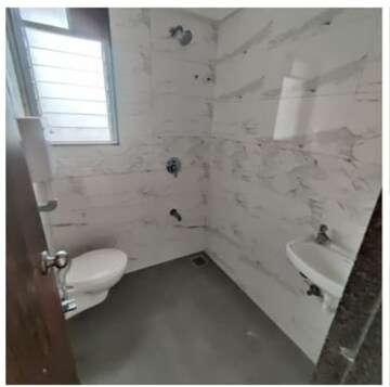 Bathroom in 2 BHK Apartment at Millionaire Heritage, Andheri West – for Sale