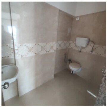 Bathroom in 2 BHK Apartment at Millionaire Heritage, Andheri West – for Sale