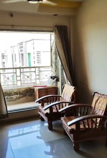 Living Room in 1 BHK Apartment at Agarwal Paradise, Virar West – for Sale