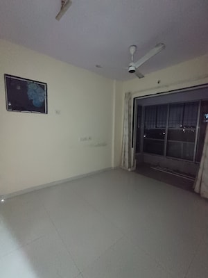 Room in 1 BHK Apartment at Bindra Marigold CHS, Andheri East – for Sale