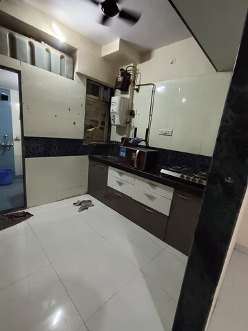 Kitchen in 1 BHK Apartment at Bindra Marigold CHS, Andheri East – for Sale