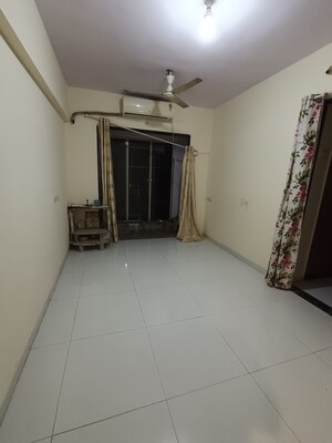 Room in 1 BHK Apartment at Bindra Marigold CHS, Andheri East – for Sale