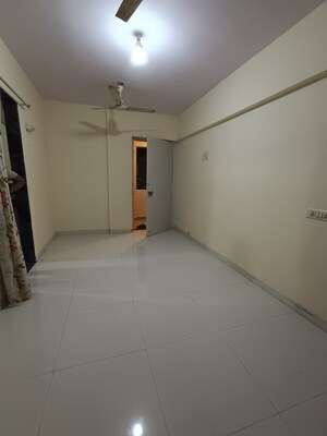 Room in 1 BHK Apartment at Bindra Marigold CHS, Andheri East – for Sale