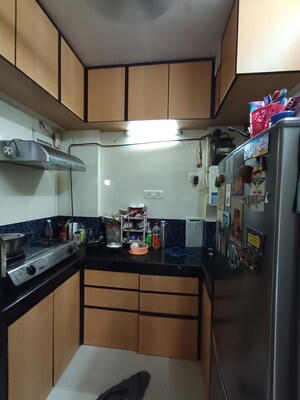 Kitchen in 1 BHK Apartment at Bindra Marigold CHS, Andheri East – for Sale