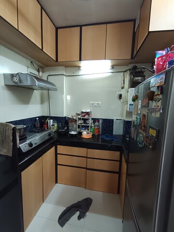 Kitchen in 1 BHK Apartment at Bindra Marigold CHS, Andheri East – for Sale