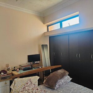 Living Room in 1 BHK Apartment at K Raheja Heights, Malad East – for Rent