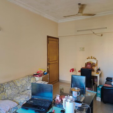 Living Room in 1 BHK Apartment at K Raheja Heights, Malad East – for Rent