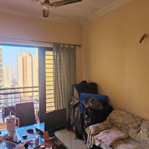 Living Room in 1 BHK Apartment at K Raheja Heights, Malad East – for Rent