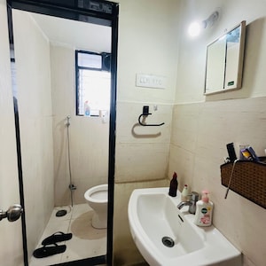 Bathroom in 2 BHK Apartment at Reelicon Felicia, Link Road – for Rent