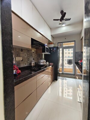 Kitchen in 2 BHK Apartment at Rustomjee Azziano Wing E, Thane West – for Sale