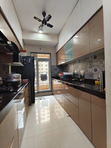 Kitchen in 2 BHK Apartment at Rustomjee Azziano Wing E, Thane West – for Sale